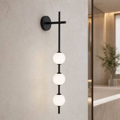 Vertical Globe Wall Light Glass Shade Brass LED Sconce