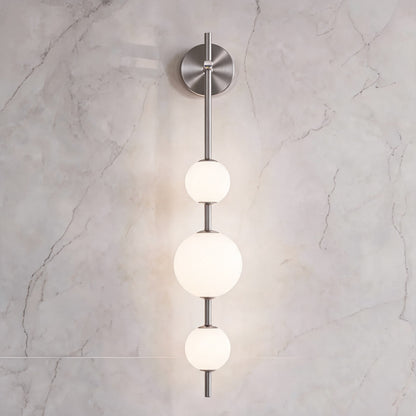 Vertical Globe Wall Light Glass Shade Brass LED Sconce