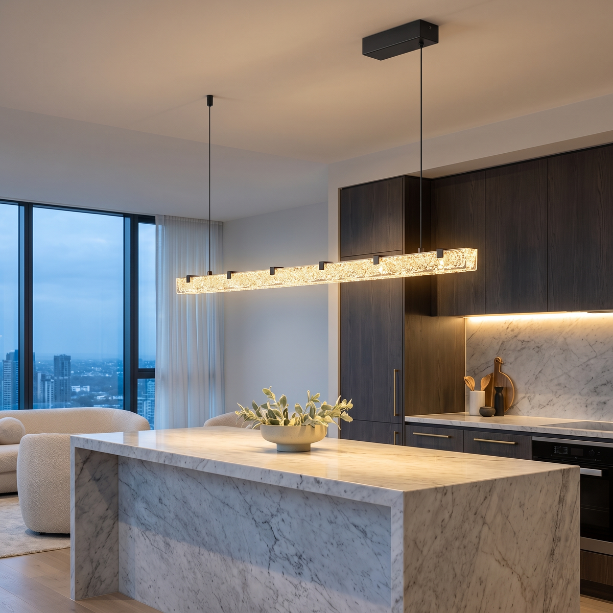 Pearl Black L120cm B linear crystal LED pendant light above a marble kitchen island