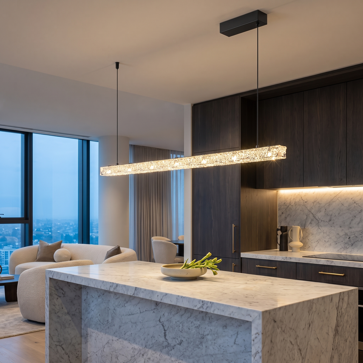 Pearl Black L150cm B linear crystal LED pendant light above a marble kitchen island