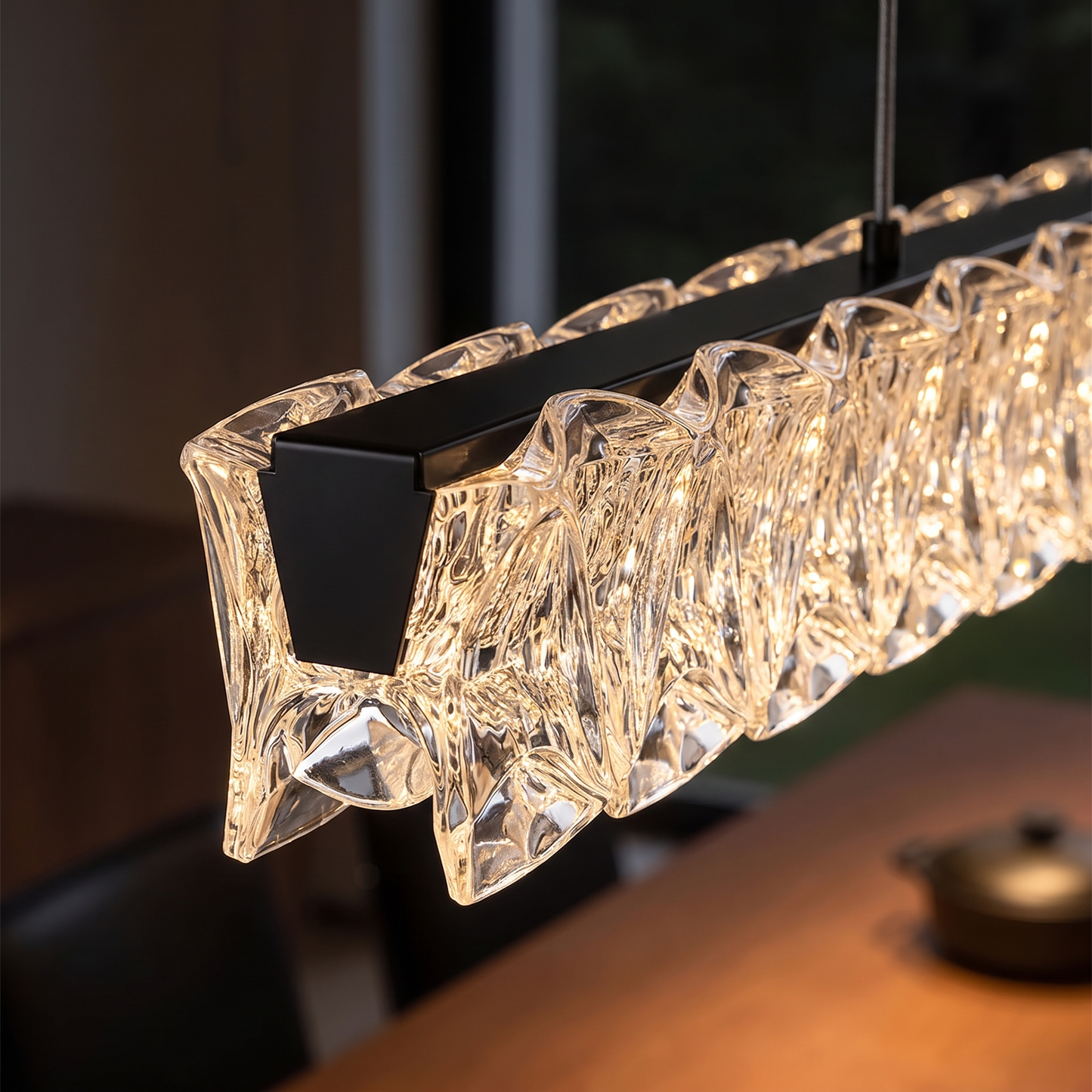 Italian linear crystal LED pendant light - close-up of the black end cap and crystal acrylic blocks